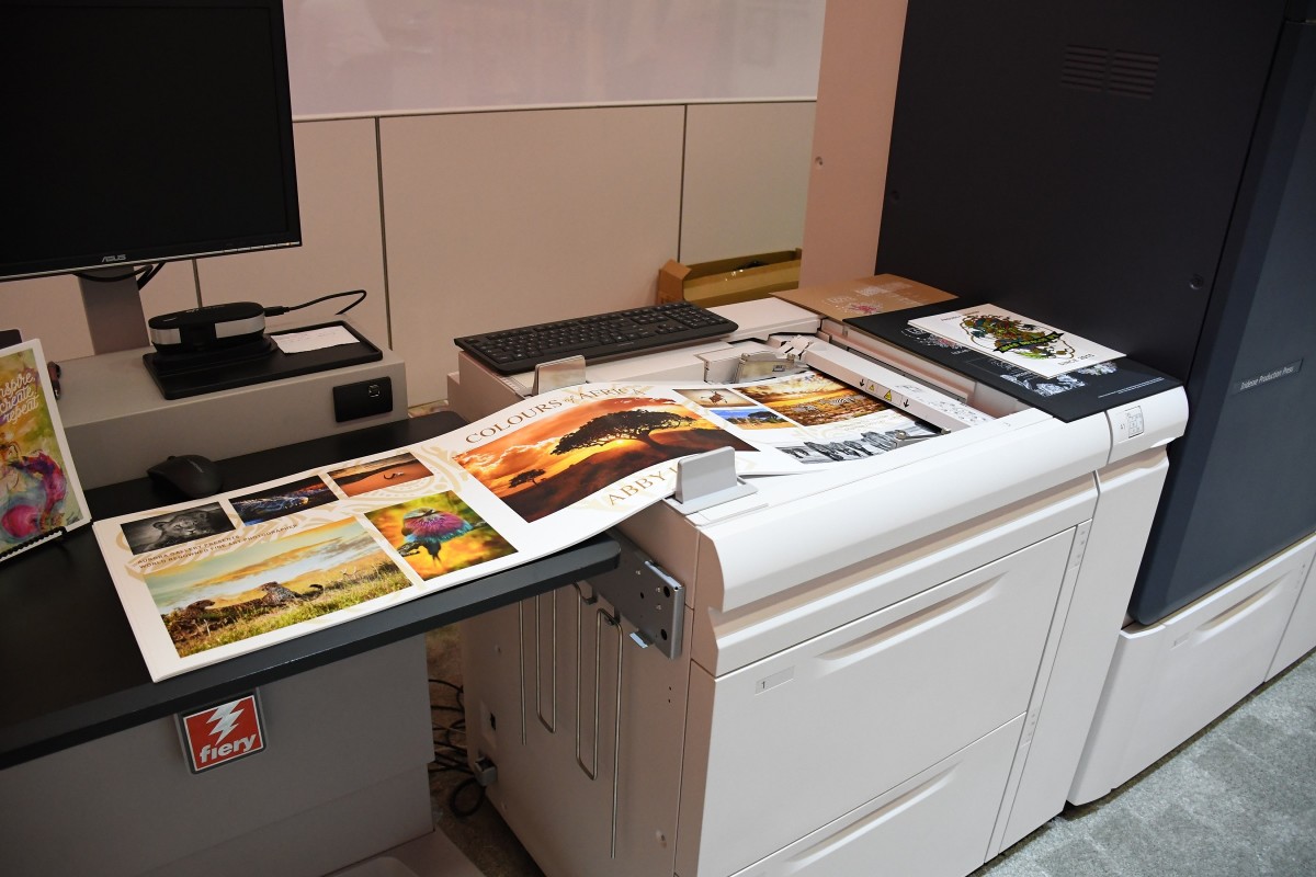 Xerox Iridesse Production Press with print samples on extra long paper