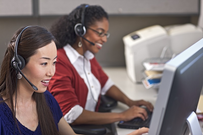 two women working at a call centre