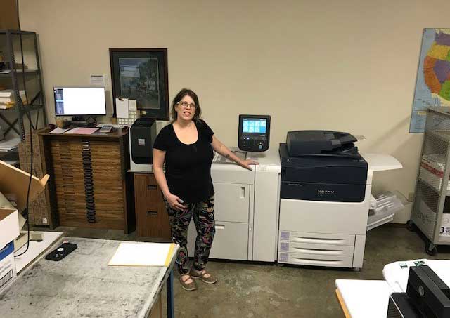 Staff of Midwest Type and Printing with their Xerox Versant Press