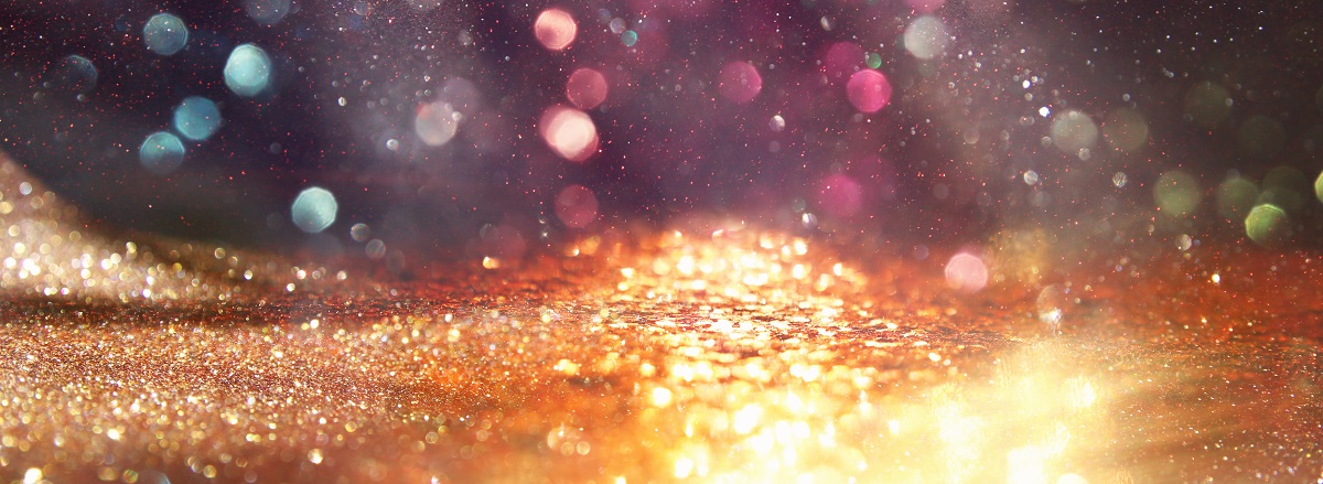 Sunlight through gold sparkles