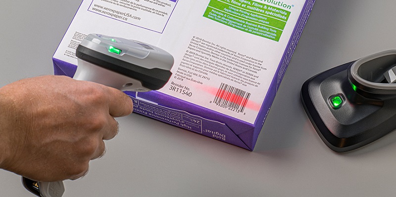 Person scanning a printed bar code