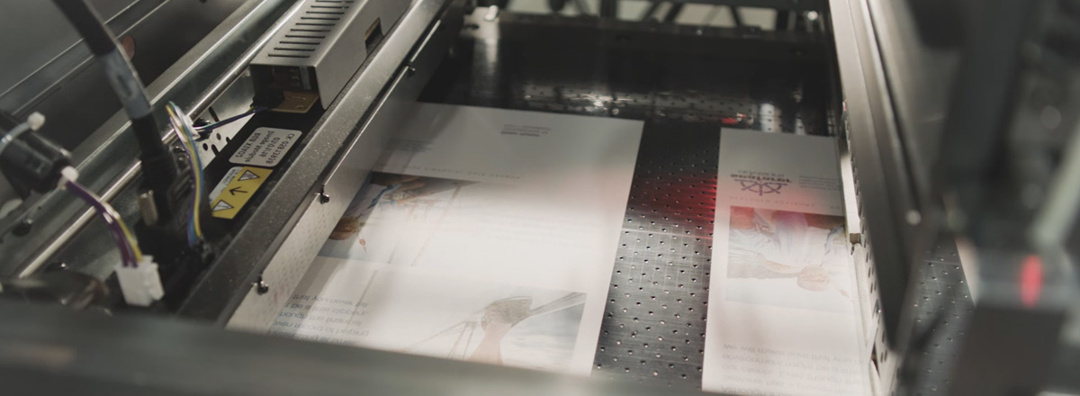 Paper running through a cut sheet digital press