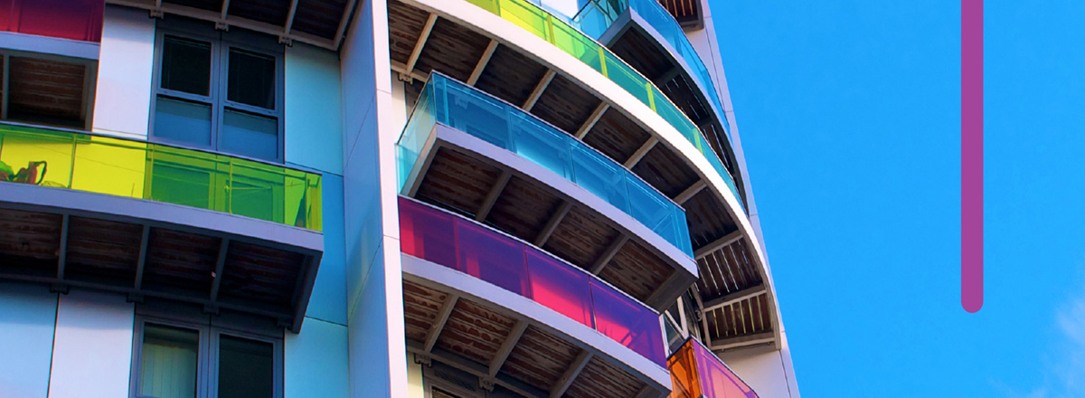 Rounded building with colorful balconies