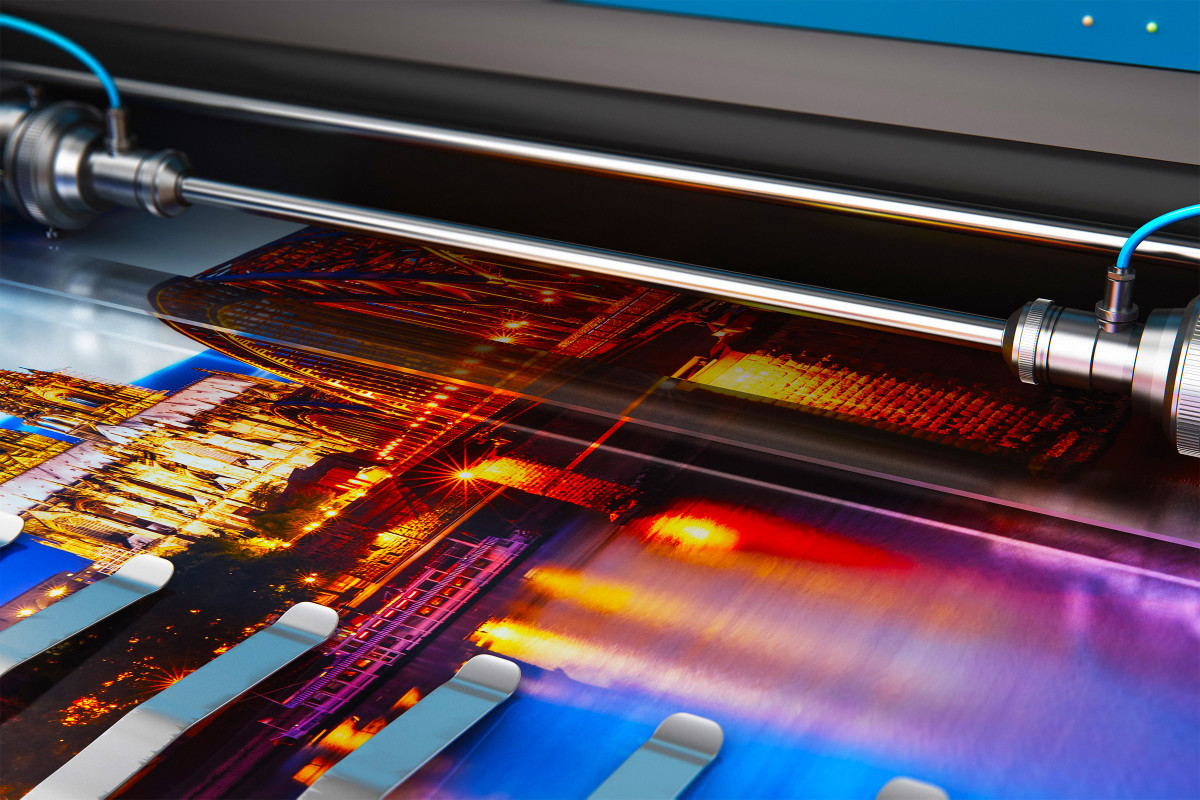 Photo of vibrant colorful prints in a printing press