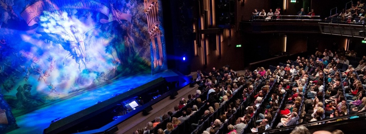 Theatre audience watching a show on stage