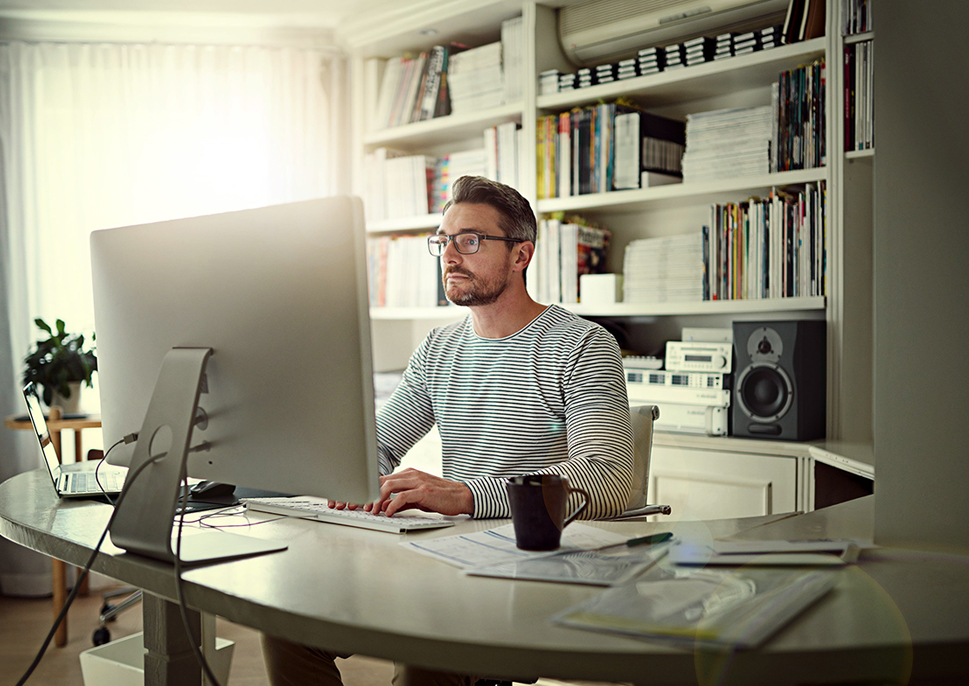 man working desktop home office