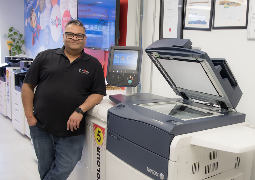 Snehal Shah of Print2Go with their Versant Press