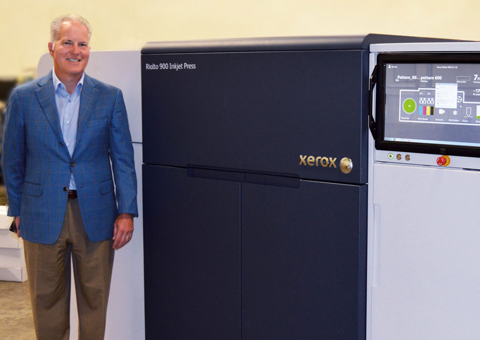 Michael Vitch, president of Compu-Mail, with their Rialto 900 Press