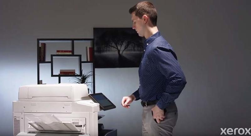 Man using a Xerox MFP
