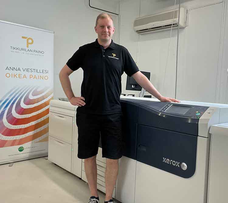 Tikkurilan Paino owner Harri Strandell with their Xerox digital press
