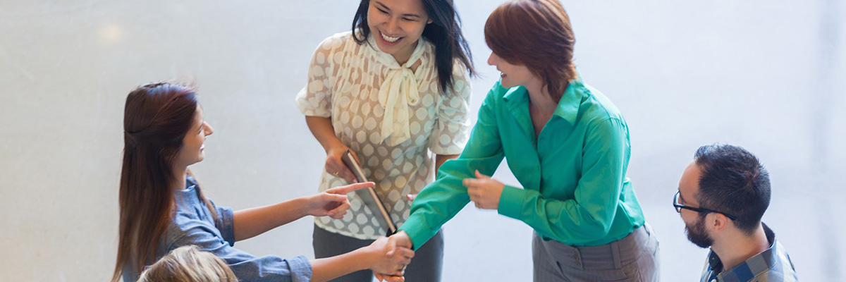 co-workers shaking hands