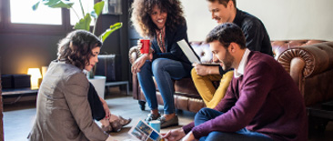 A group of people reviewing documents