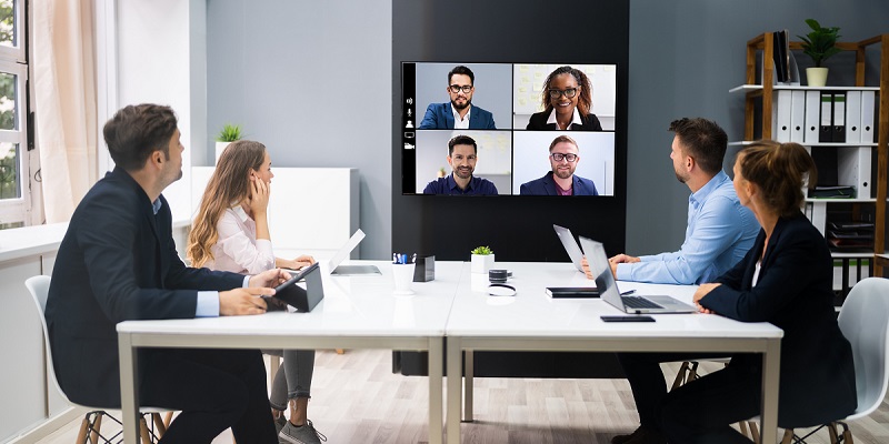 employees at a virtual meeting