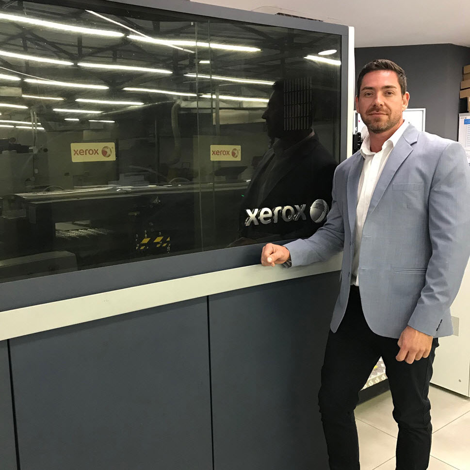 Tertius van Eeden, CEO of Print on Demand, with their Trivor Press