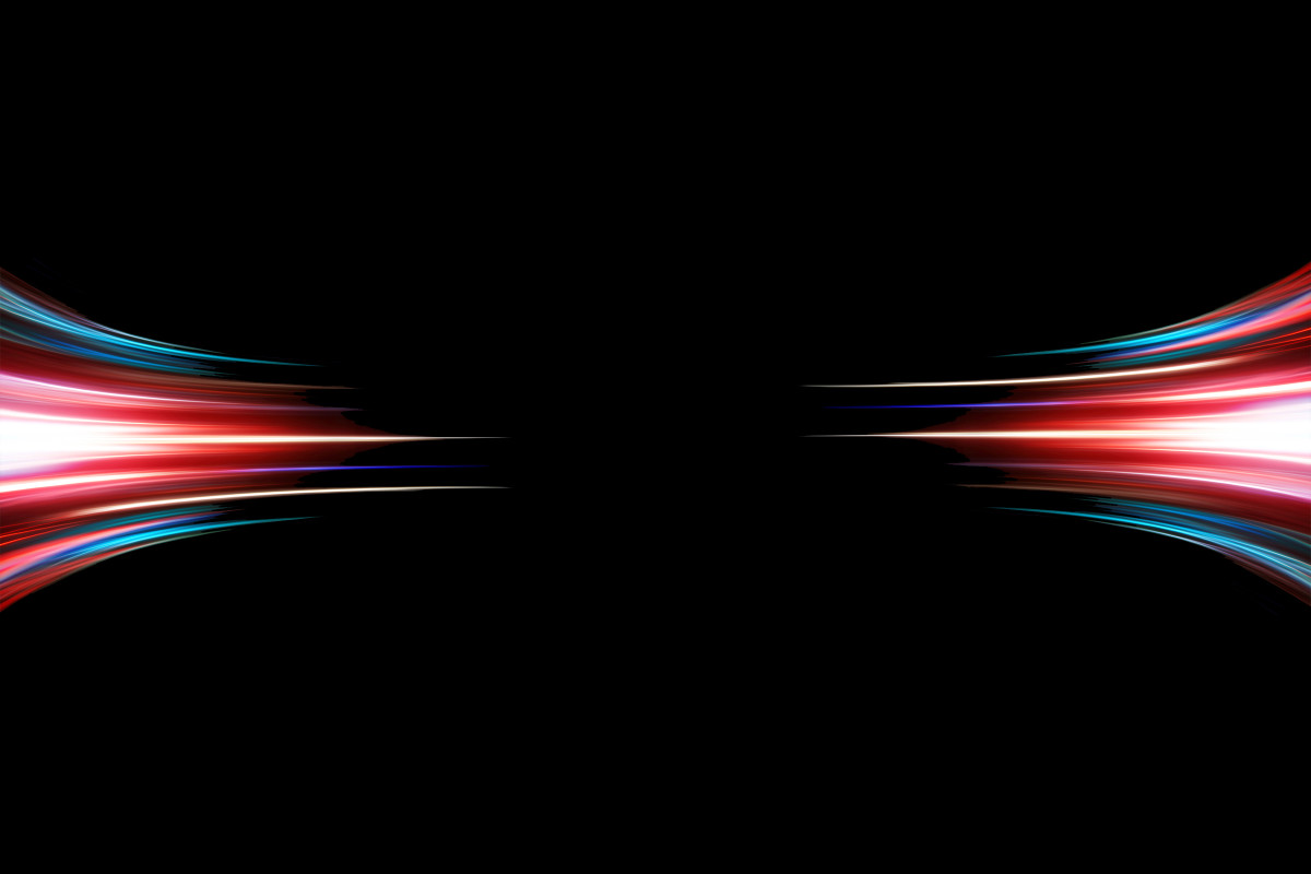 Black background with white, red and blue rays of light