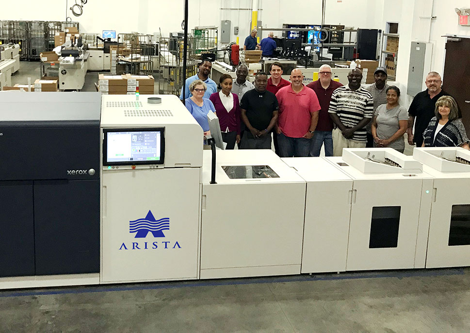 Staff at Arista Information Systems with their Rialto press