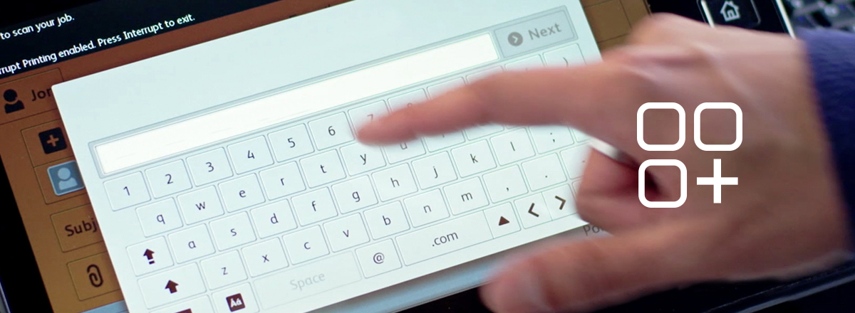 Finger typing on the ConnectKey user interface, overlaid with an icon indicating a touchscreen