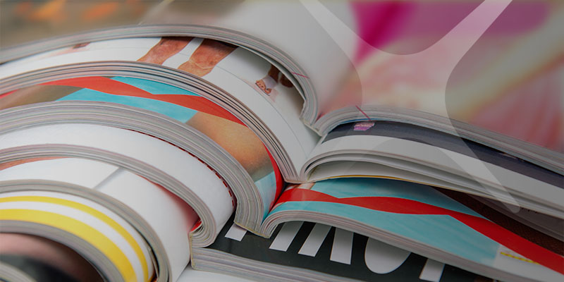 Stack of colorful, bound booklets