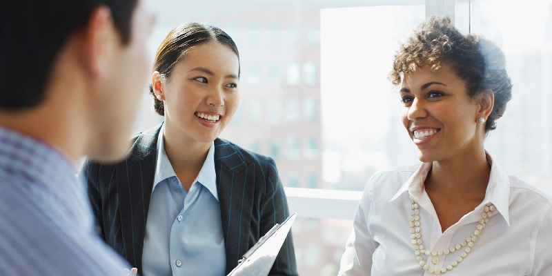 Two women smiling