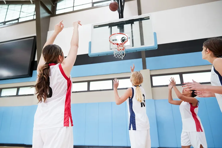 Girls playing basketball