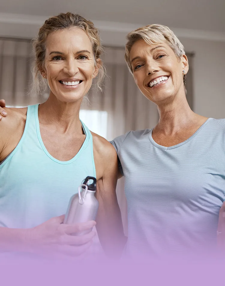 Two smiling middle-aged women