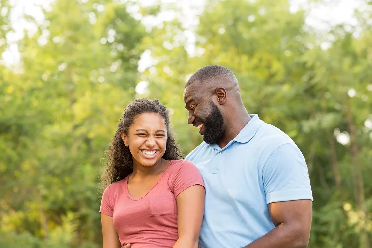 Portrait of a daughter and father smiling