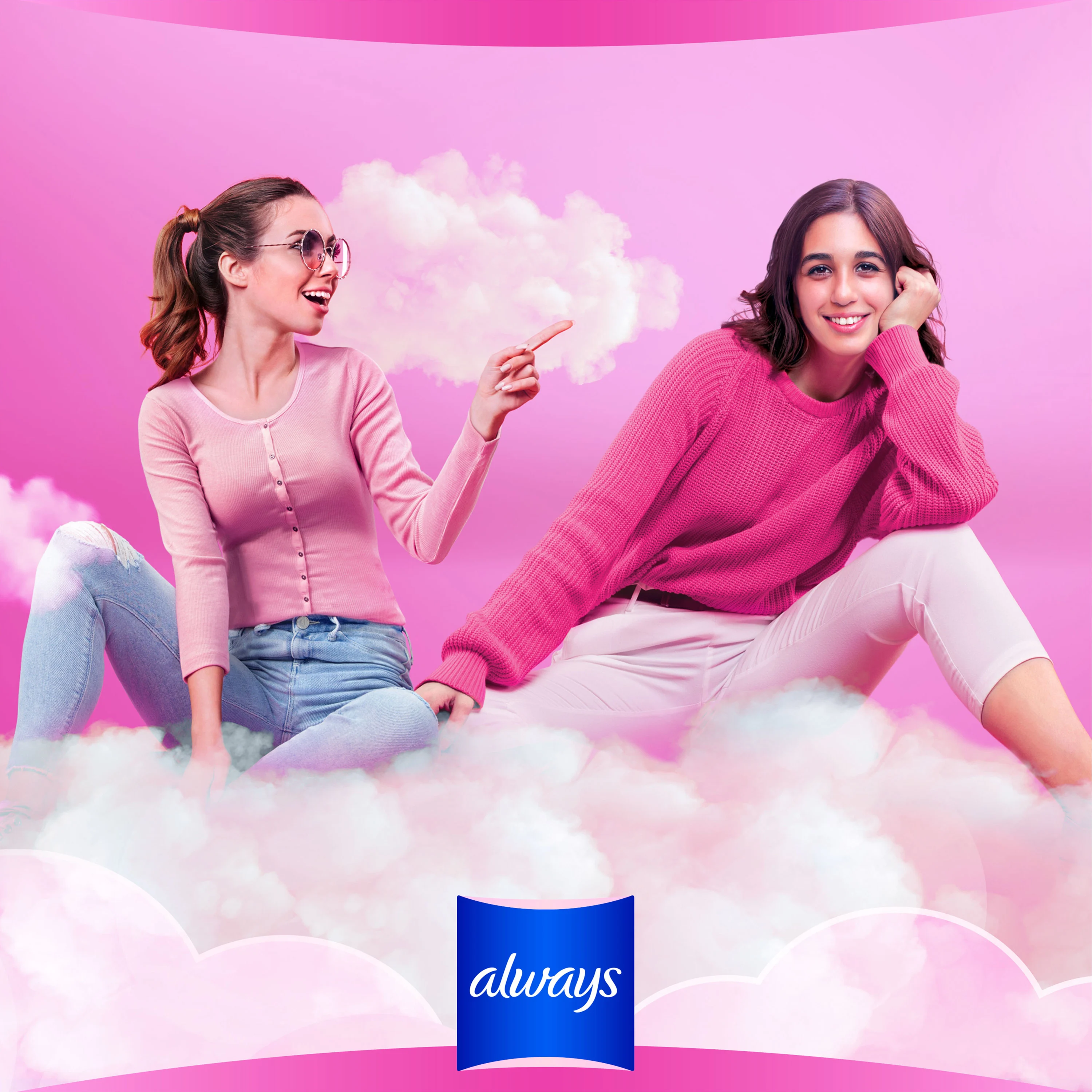 Two girls sitting on clouds