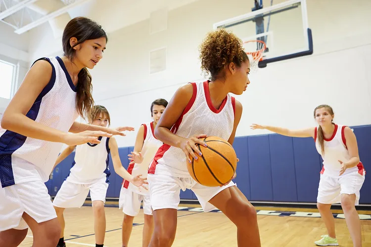 Girl's basketball team playing