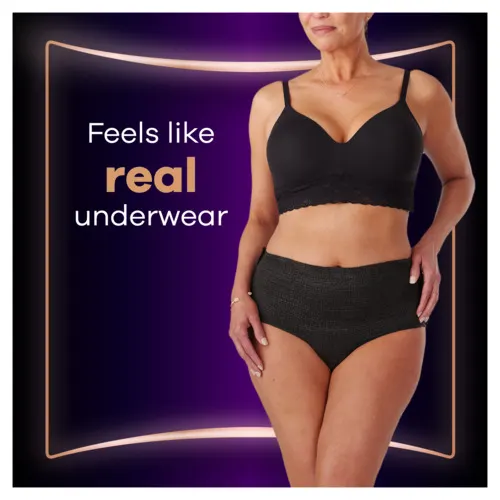 Super absorbent core is being dipped in purple liquid and absorbs it fully.