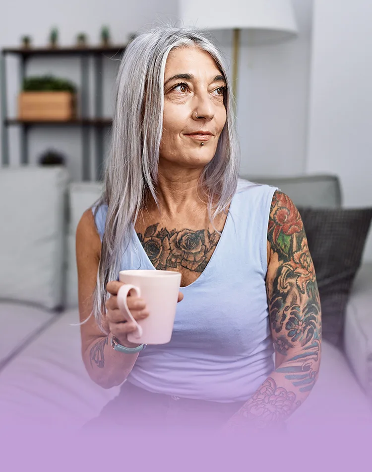 Middle-aged woman with a cup in her hand