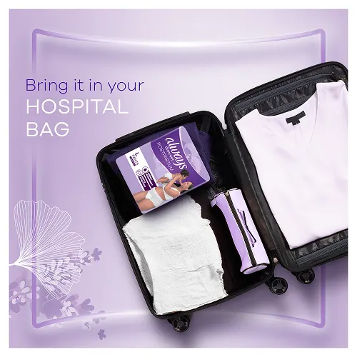 Hospital bag for baby delivery containg postpartum pants and clothes