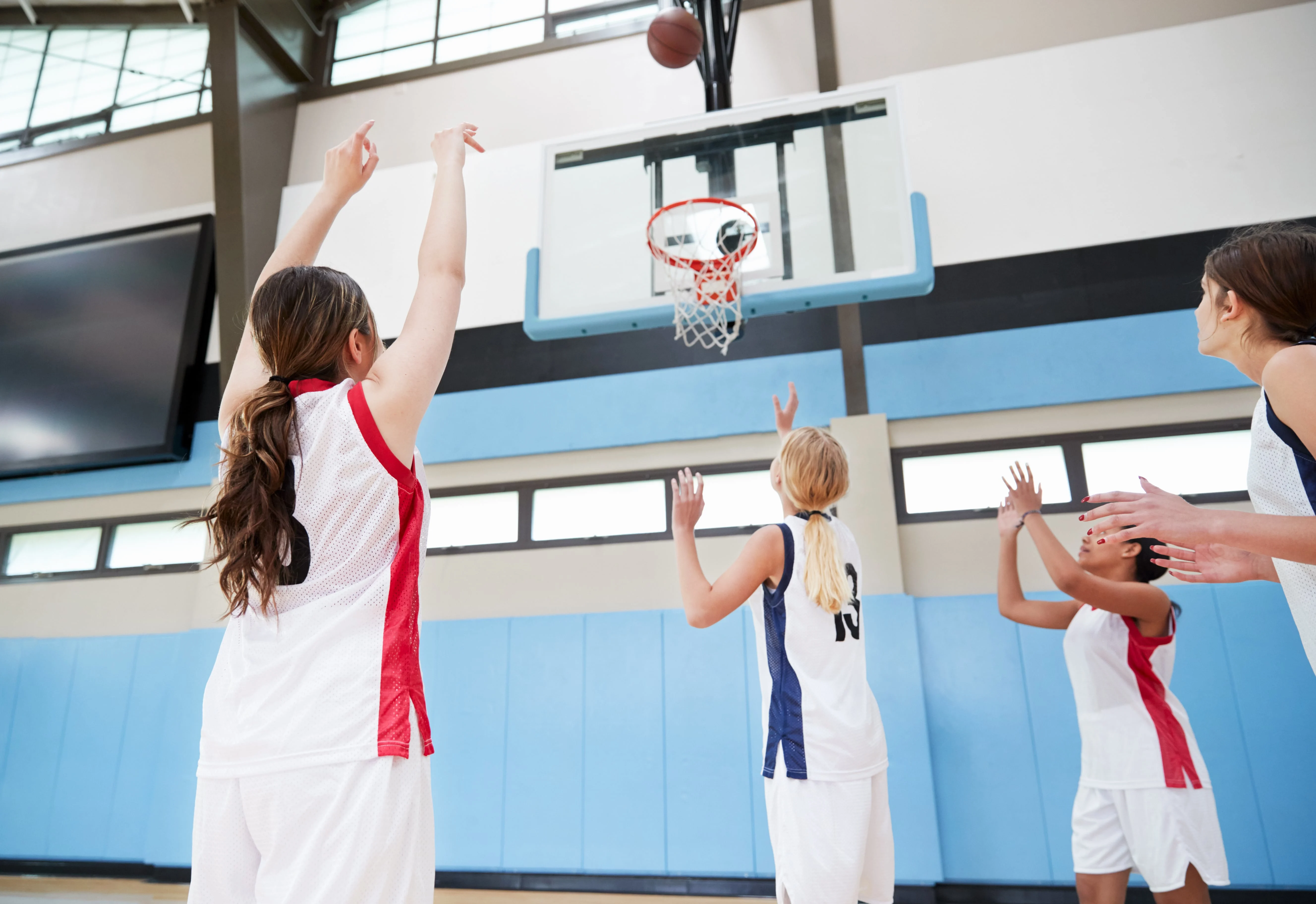 Girls playing basketball