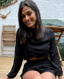Portrait of Vijaya dressed in black