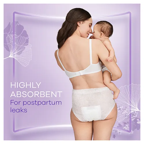 Mum wearing postpartum pants caring her newborn baby