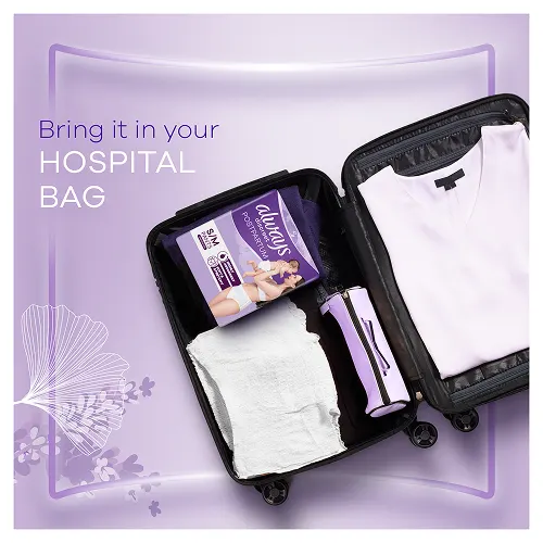 Hospital bag for baby delivery containing postpartum pants and clothes