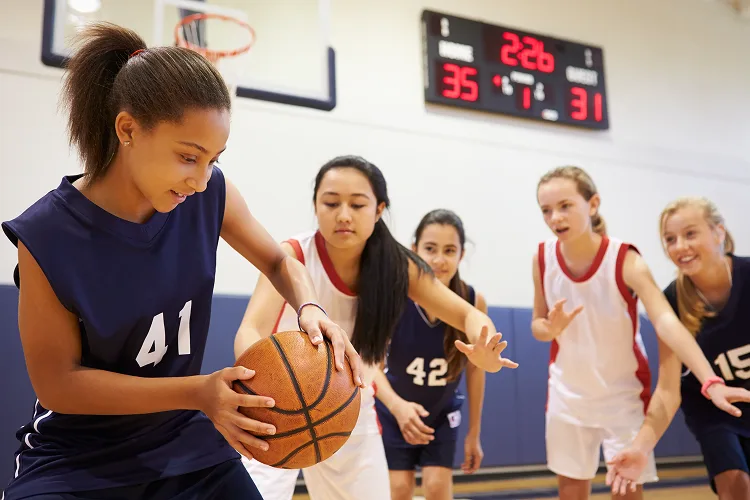 Girls playing basketball