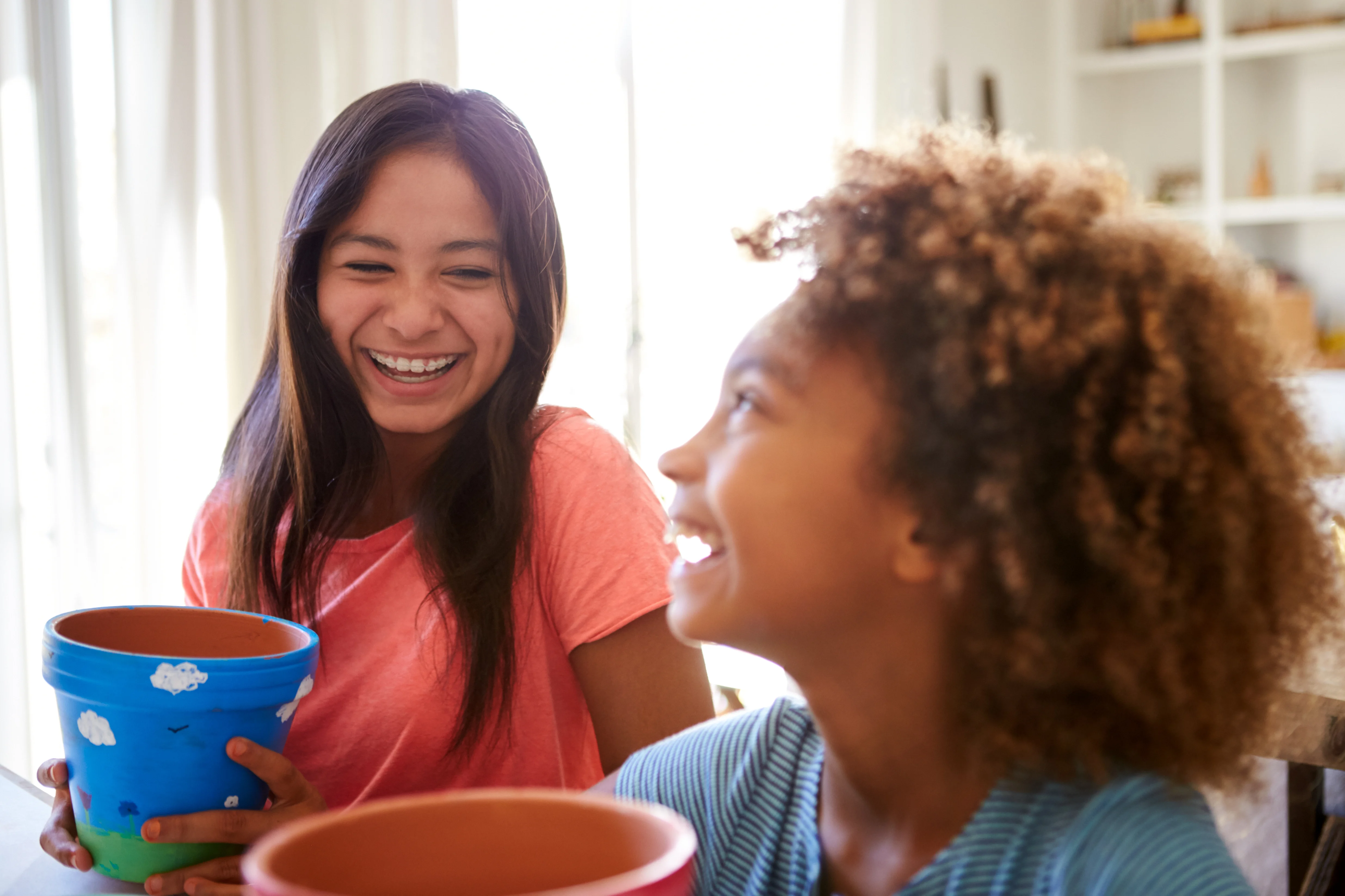 Two young girls smiling