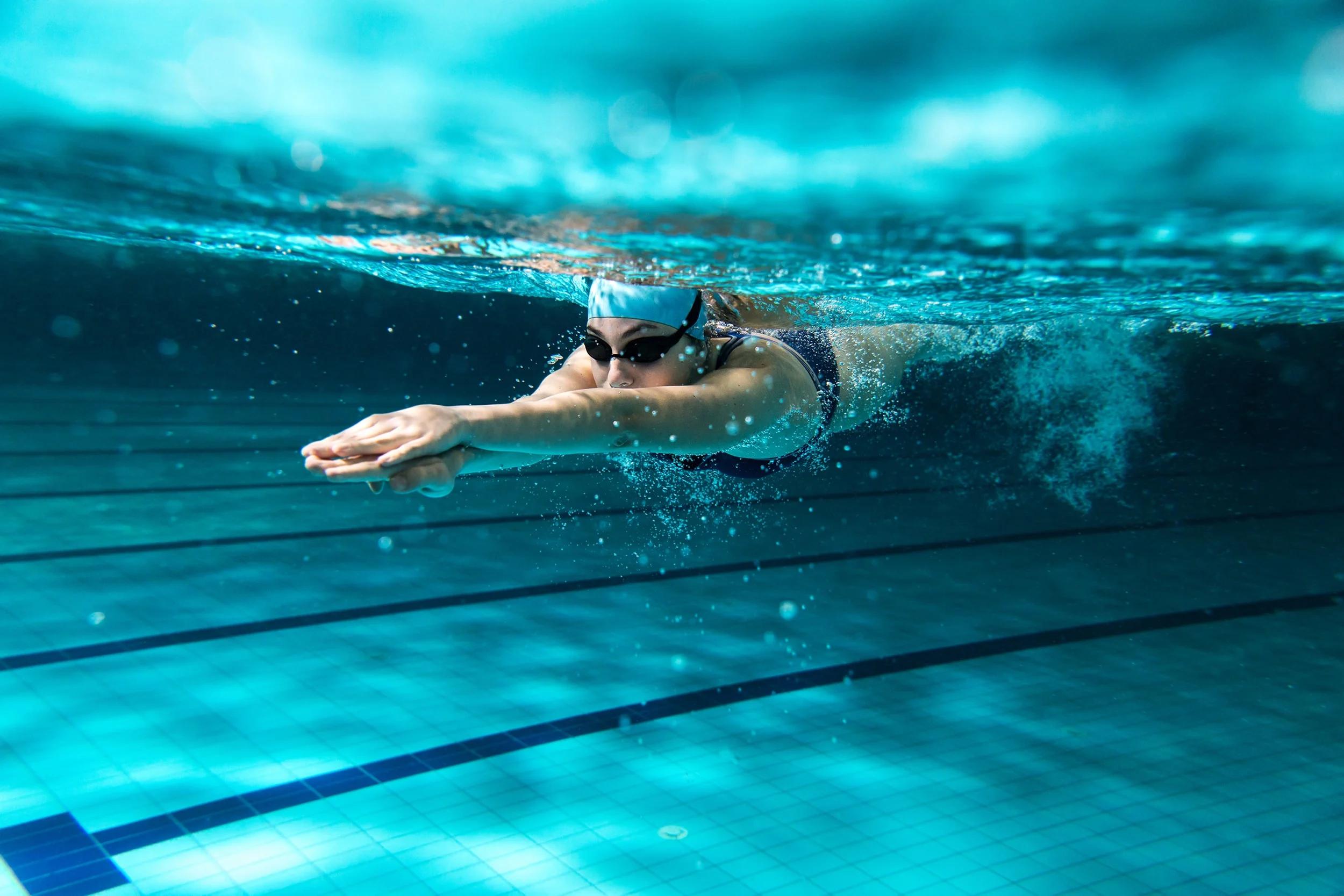 Underwater photo of a girl swimming