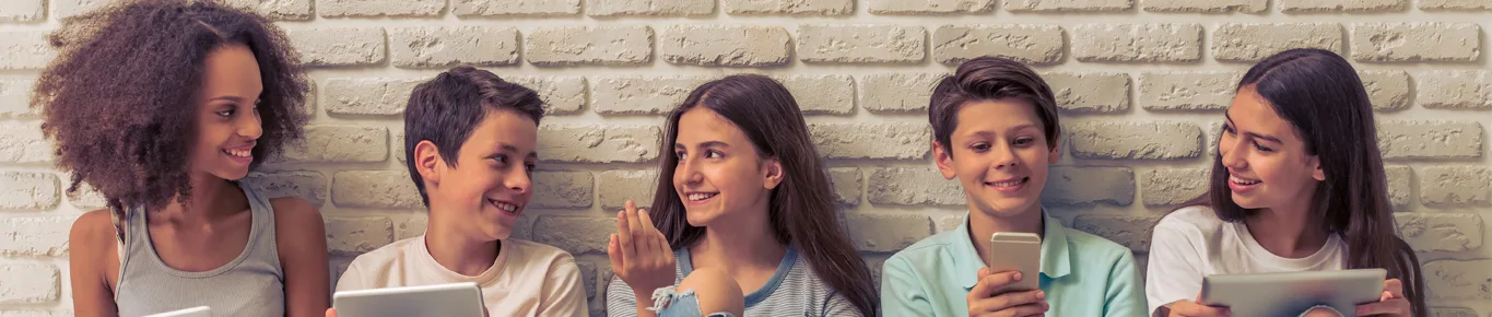 Teenagers sitting on the floor and talking