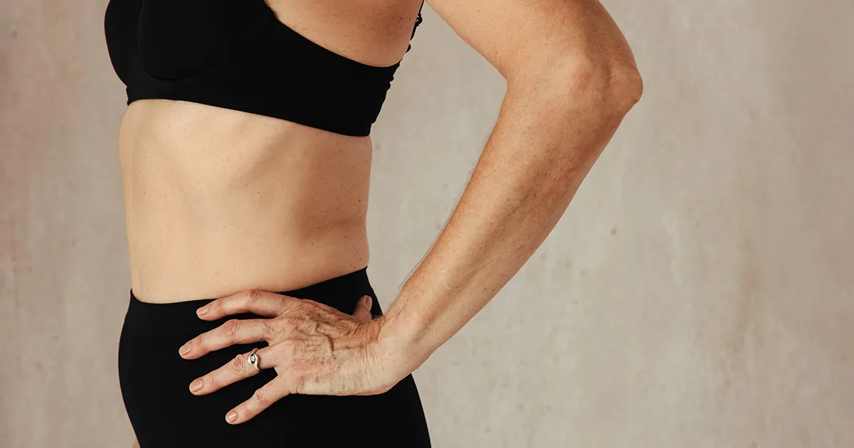 Middle aged woman body with black underwear