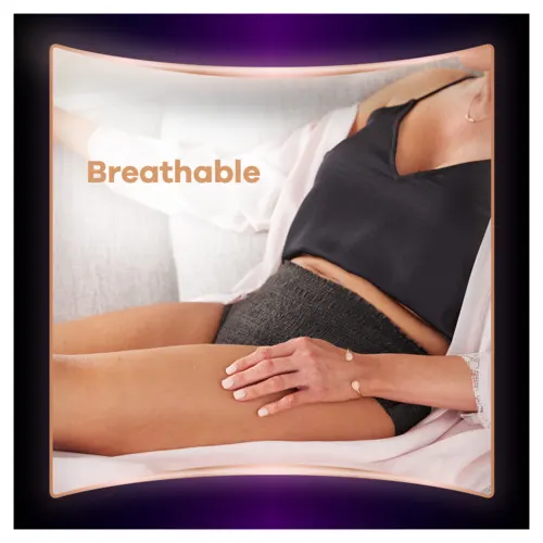 Woman on couch in lingerie and Boutique Pants that are breathable.