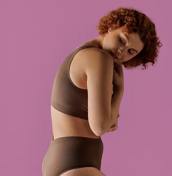 Woman on her profile with eyes closed and message symptoms explained