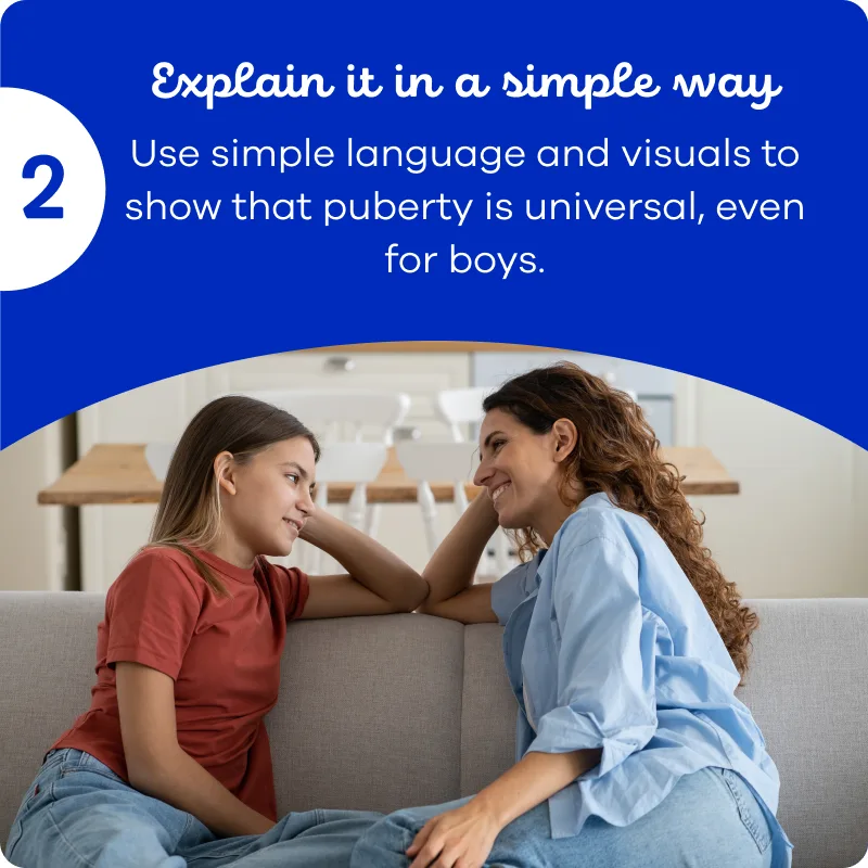 Mother sitting on a couch with her daughter explaining her puberty in a simple way