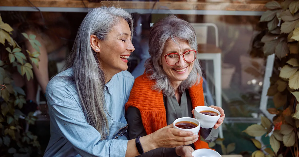 Two women smiling