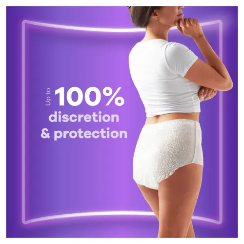 Woman wearing Always Discreet Pants that give up to 100% discretion and protection.