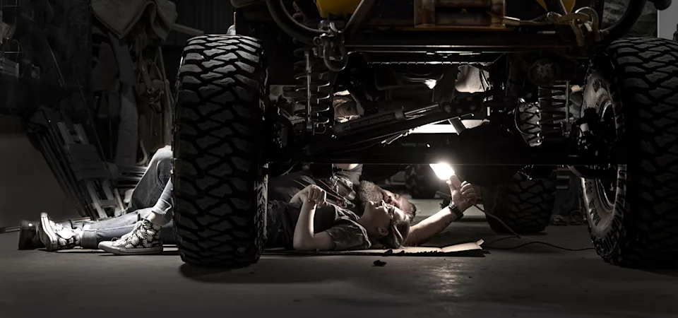 Father & Daughter Working on Jeep Wrangler