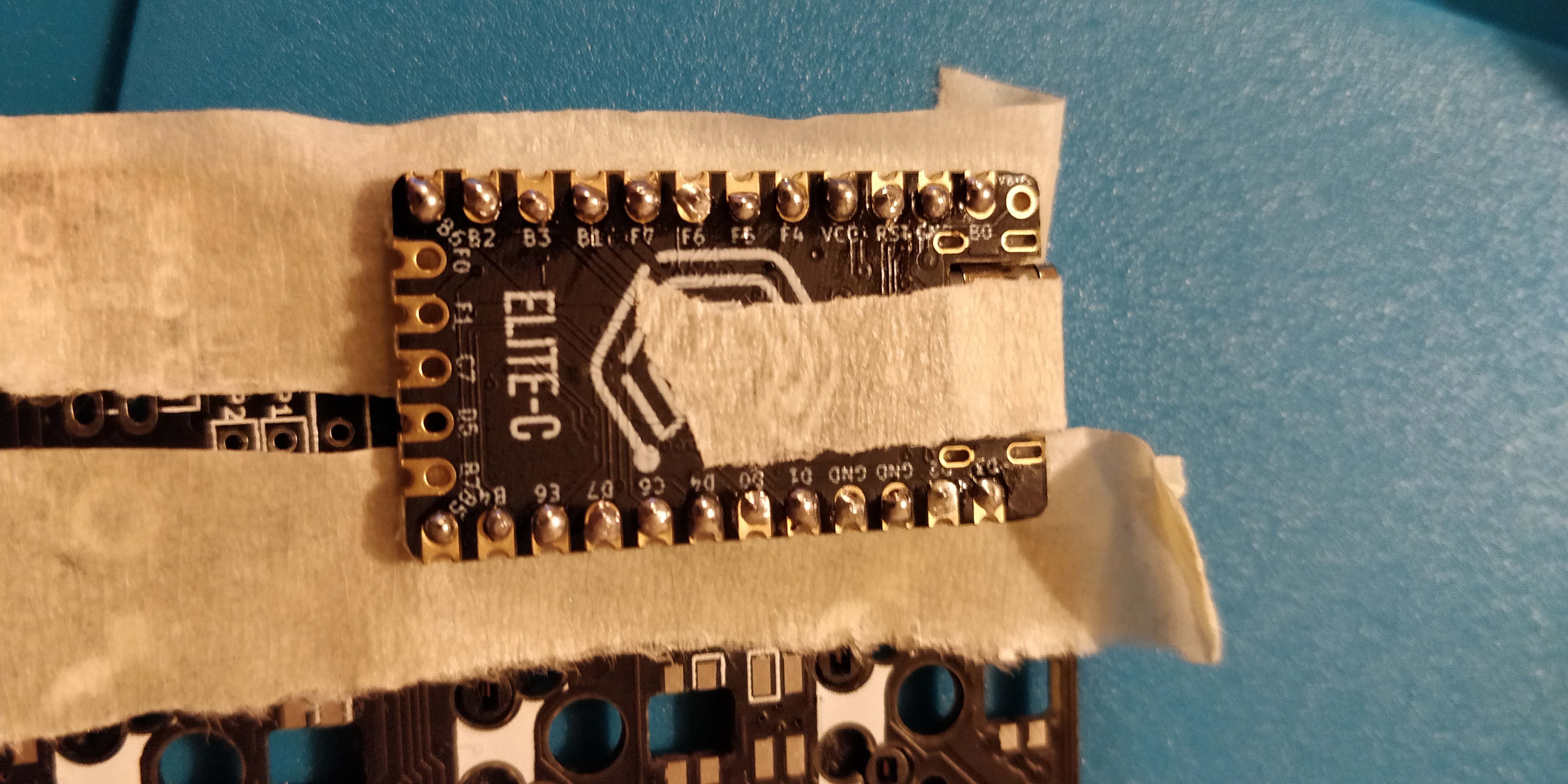 step 10 - corne crkbd - place microcontroller through pins and solder