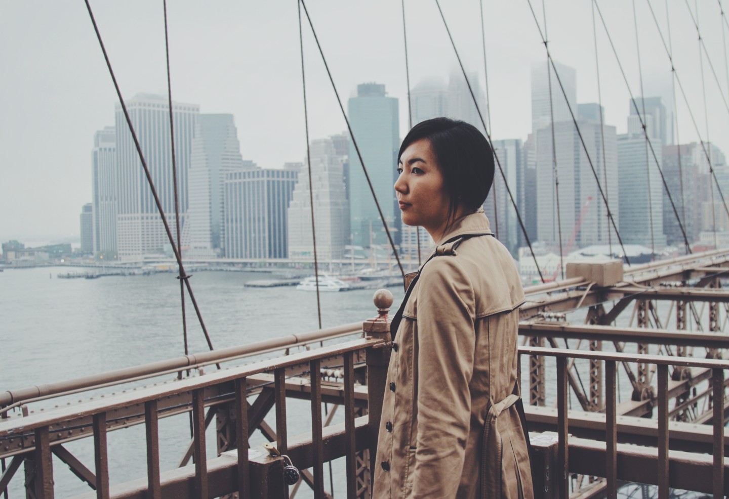 woman-standing-on-bridge