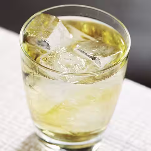A glass of Bulleit Bourbon with tonic and ice. Click to find our recipe for bourbon with tonic