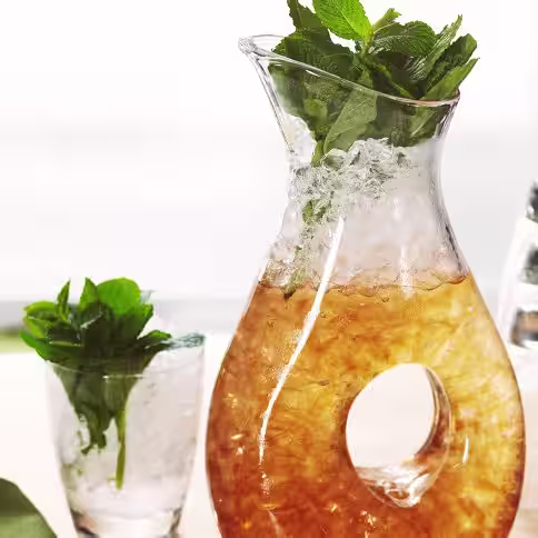 A pitcher of mint julep. Click to find our recipe for mint julep